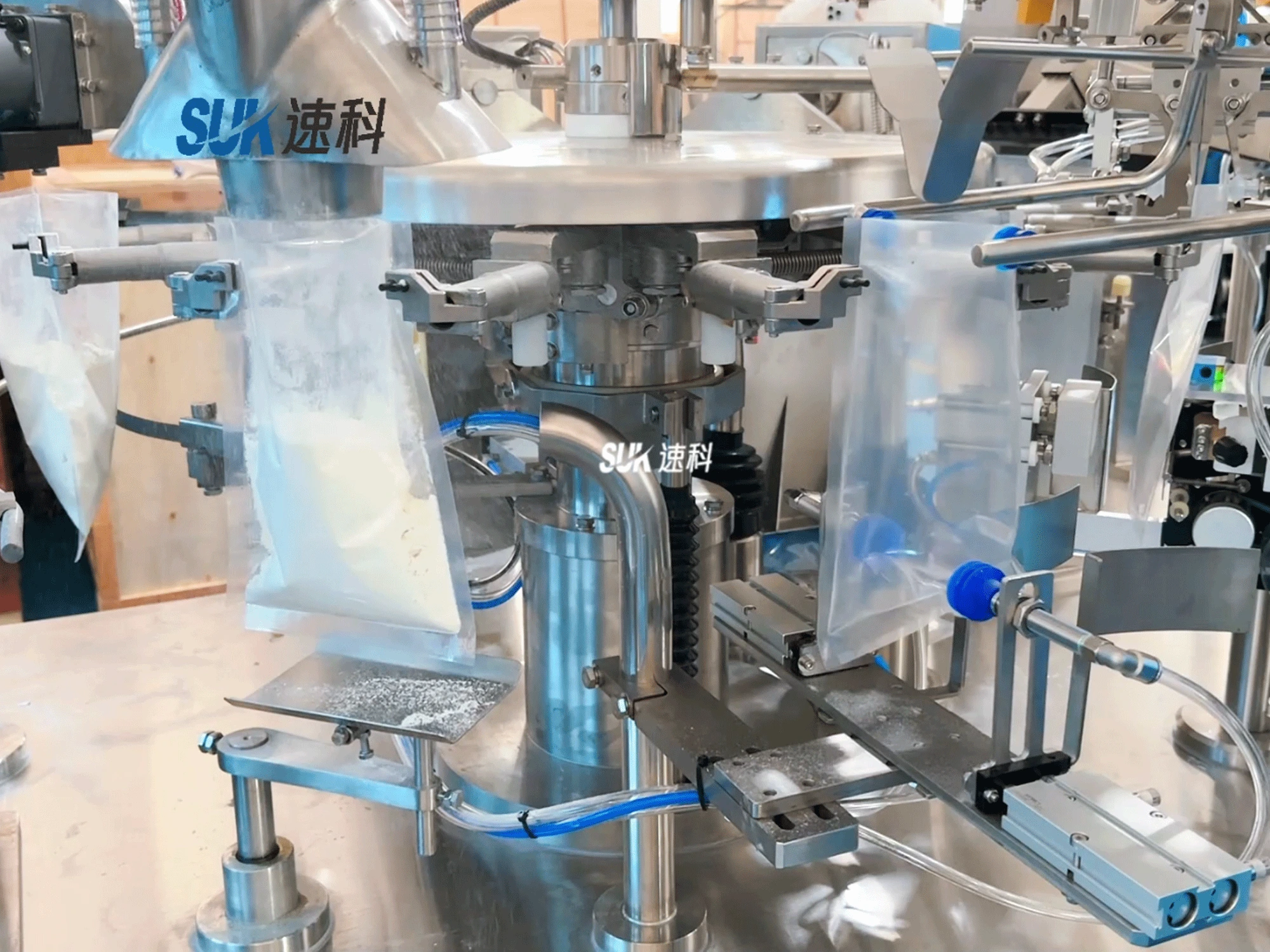 Feeding and filling process on SUK tapioca starch powder packaging equipment; illustrative of machine configuration, not a customer project
